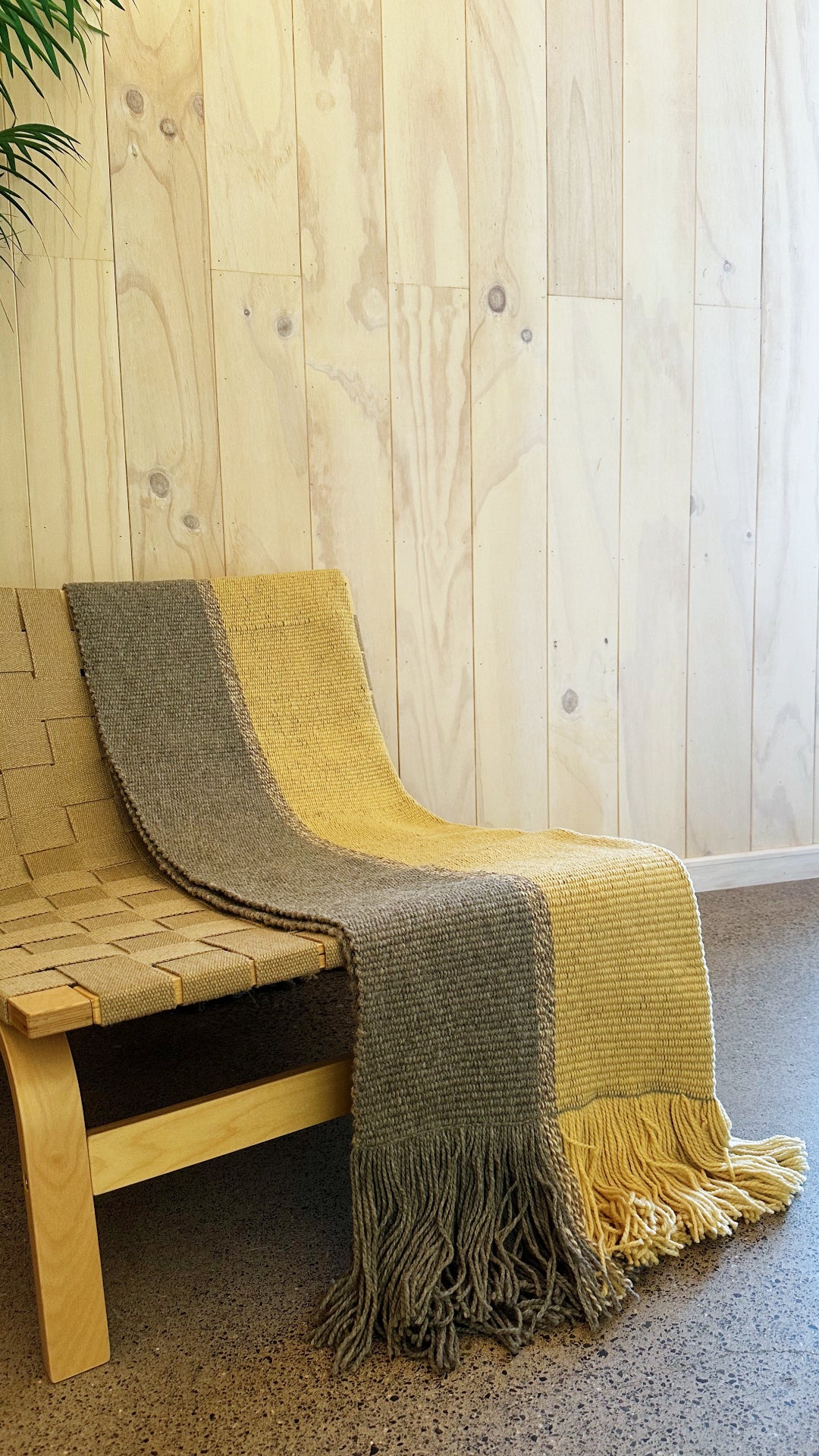 Ranco Dune and Stone wool throw folded showing clean seam between sand and grey – Eduardo Calisto